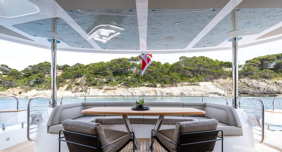 M/Y Lio Black Knight Sunseeker 95 aft deck alfresco dining — luxury yacht charter Mallorca