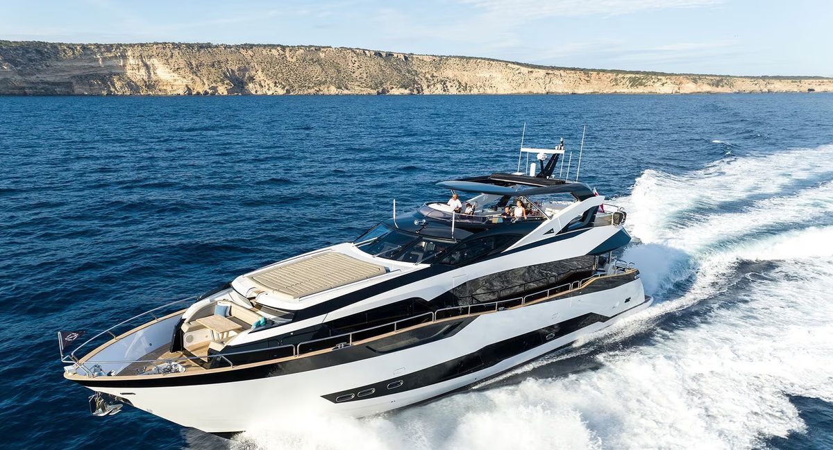 M/Y Lio Black Knight Sunseeker 95 bow with jet skis and tender — yacht charter water toys Mallorca