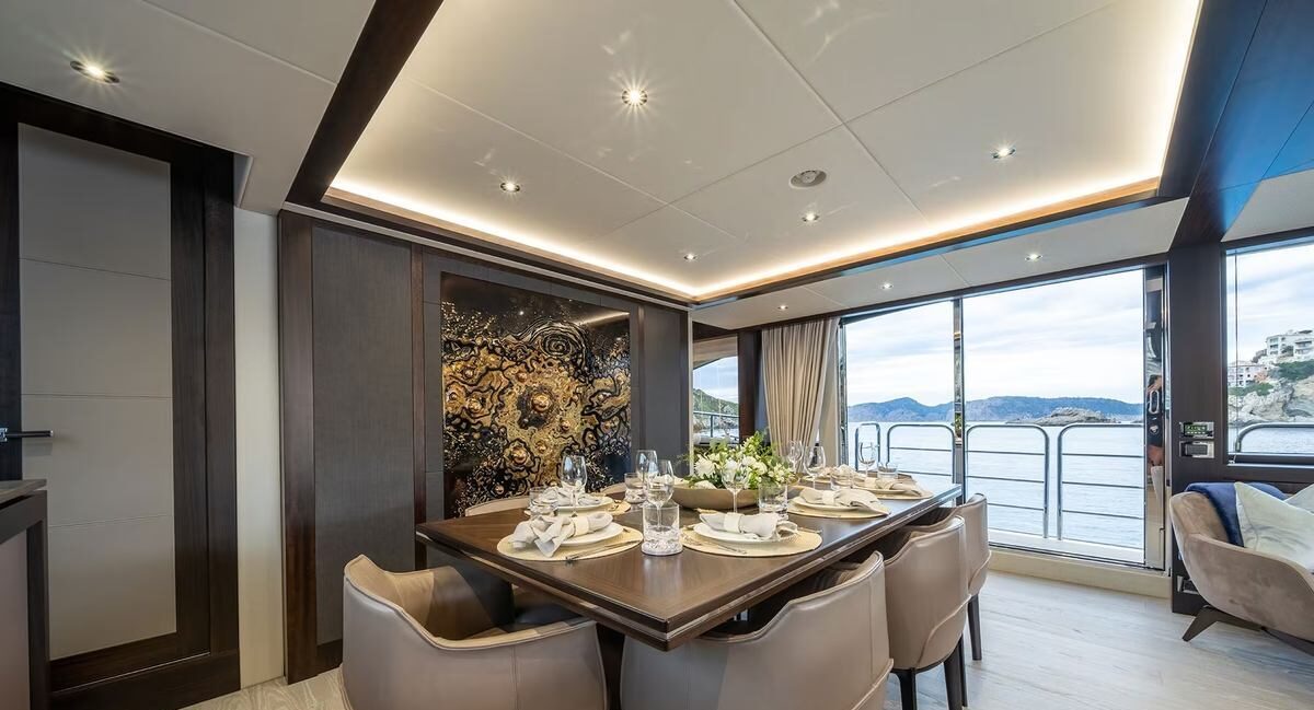 Formal dinner ambiance aboard M/Y Lio Black Knight Sunseeker 95 — luxury yacht charter dining