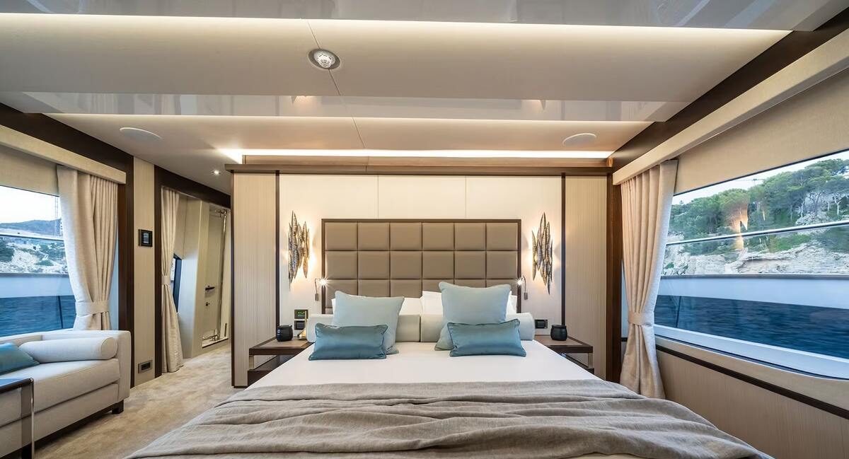 M/Y Lio Black Knight Sunseeker 95 full-beam master suite — luxury yacht charter accommodation