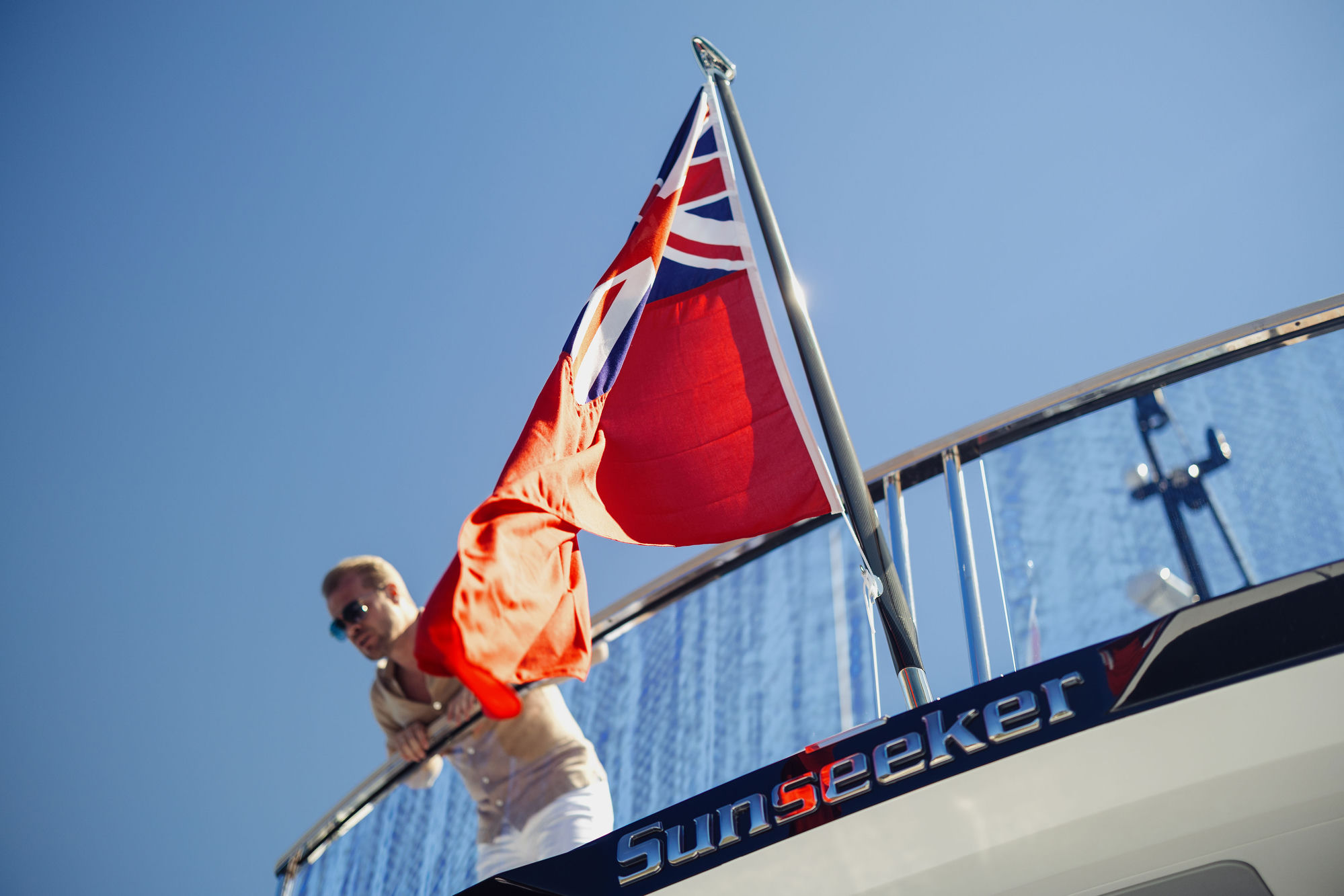 M/Y Lio Black Knight Sunseeker 95 flag and Red Ensign — luxury yacht charter heritage